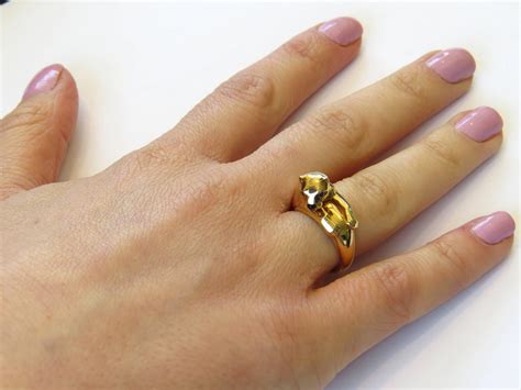 cartier panther ring on finger